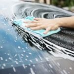 man wash car using shampoo every day life car care concept